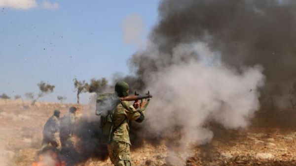 The National Liberation Front said the withdrawal of heavy arms from the Idlib buffer zone will take several days. (AFP/File)
