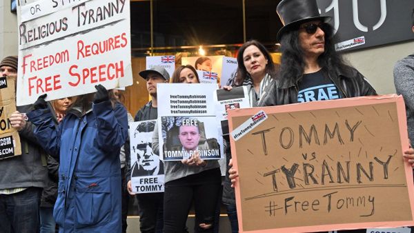 Tommy Robinson supporters protesting (AFP)