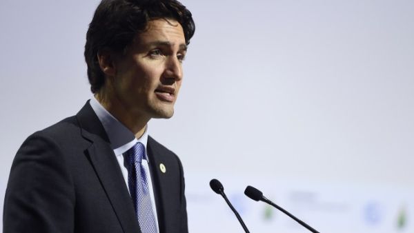 This comes after online petitions signed by 10,000 Canadians, collected in just five days, urged Trudeau to act and to revoke Suu Kyi’s honorary Canadian citizenship. (AFP/File)
