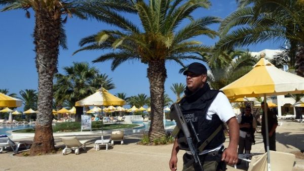 A Tunisian security member stands next to a swimming pool at the resort town of Sousse. (AFP/Fethi Belaid)