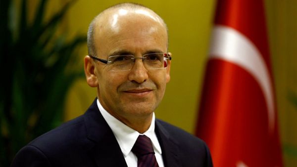 According to Turkey's Deputy Prime Minister Mehmet Simsek, the US-Turkey visa row is only a temporary dispute that will be resolved soon. (AFP)