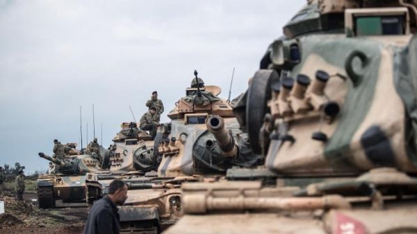 Turkish tanks waiting at the border of Afrin (AFP/FILE)