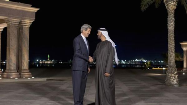 U.S. Secretary of State John Kerry speaks to Abu Dhabi's Sheikh Mohammed bin Zayed al-Nahyan before their meeting at the Emirates Palace in Abu Dhabi.[voanews]