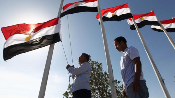 Disrespecting the Egyptian flag is now punishable under law with up to a six month prison sentence or a 5,000 pound fine (Courtesy of Chris Newbould/Digital Production Middle East)