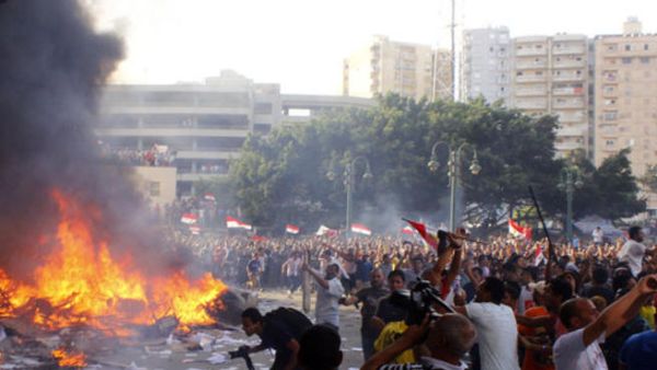 Morsi supporters clashed with Egyptian security forces throughout the country Friday leaving at least four killed in the violent exchanges (Courtesy of STR/AFP/Getty Images)