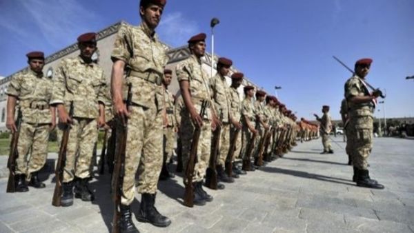Wednesday's suicide bomb death was preceded earlier last week by bomb attacks that killed more than 50 people stationed at a southern Yemen military base. Army personnel pictured here participated in a funeral for the dead soldiers earlier this week (AFP)
