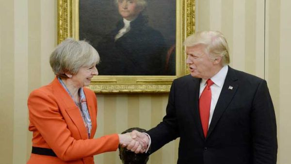 ماي أول زعيم أجنبي يجتمع بترامب بعد تنصيبه