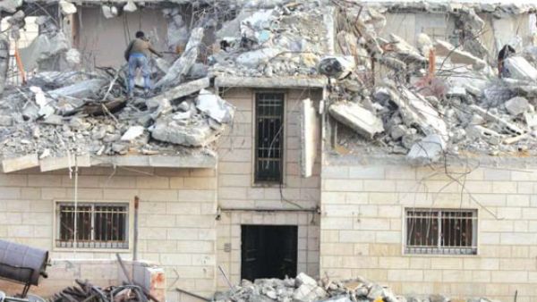 Israel demolishes the homes of Palestinian attackers as a deterrent measure, but Palestinians and the international community consider the policy collective punishment (AFP/File Photo)