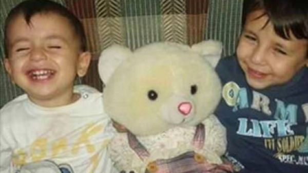 The photo of a 3-year-old drowning victim shocked the world, but not everyone agrees who to blame.