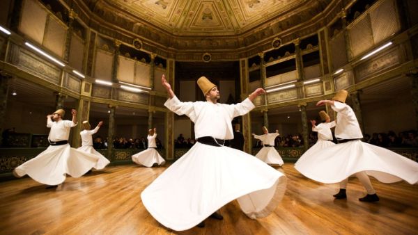 Whirling dervishes, members of the mystical Sufi tradition of Islam that 13th-century Persian poet Jalaluddin Rumi belonged to, perform their prayers in Istanbul.  (AFP/Gurcan Ozturk)