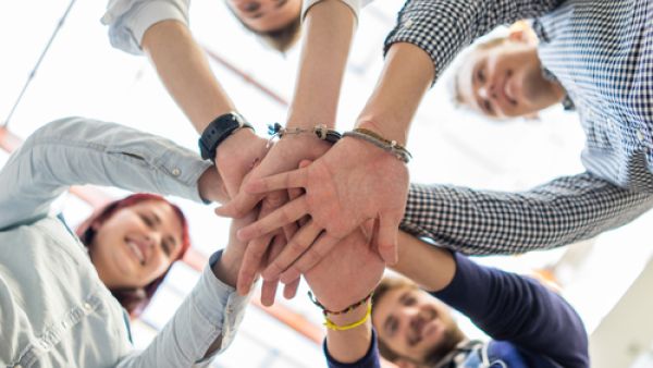 Happiness is no longer a choice for companies wishing to maximize return on their most valuable investments: their people. (File photo)