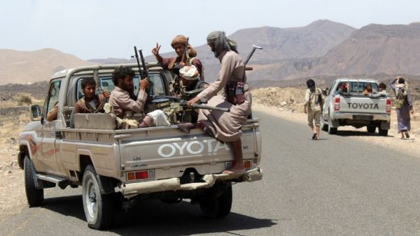 Yemeni fighters loyal to exiled President Abed Rabbo Mansour Hadi wait in their pick-up trucks on a road in the Sirwah area, in Marib province on April 9, 2016. (AFP/Nabil Hassan) Yemeni fighters loyal to exiled President Abed Rabbo Mansour Hadi wait in their pick-up trucks on a road in the Sirwah area, in Marib province on April 9, 2016. (AFP/Nabil Hassan)