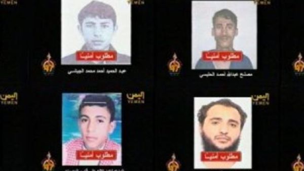 صور المطلوبين الثمانية في لقطة عن التلفزيون اليمن
