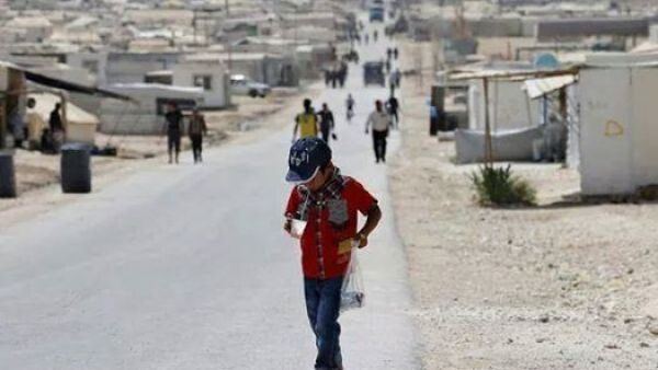 A boy is seen in Jordan's Zaatari refugee camp. Jordan hosts about 600,000 Syrian refugees, according to the UN, with more waiting to enter everyday. (AFP/File)