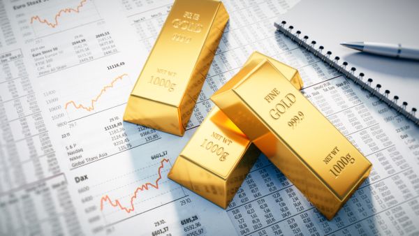 Stocks worldwide mixed as gold prices edge higher