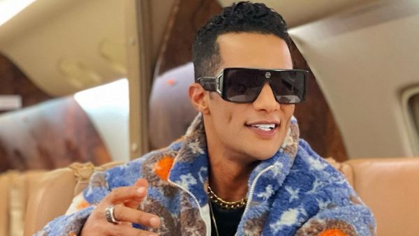Mohammad Ramadan dances with flight attendant