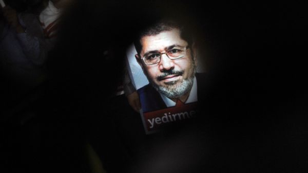  A poster of Egypt's President Mohamed Morsi is seen during a pro-Morsi demonstration in Istanbul (AFP)