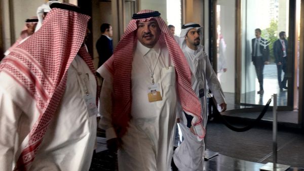 Saudi Minister of State Mohammed al-Shaikh (C) arrives for the second day of a US-sponsored Middle East economic conference in the Bahraini (AFP)