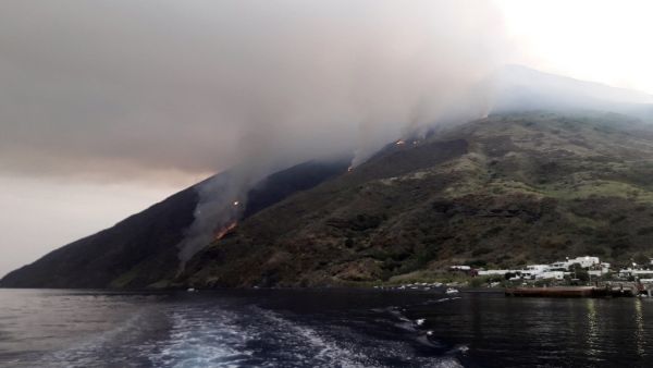 The Stromboli volcano is pictured in eruption on July 3, 2019 on the Stromboli island, north of Sicily. A volcano on the Italian island of Stromboli erupted dramatically on July 3, reportedly killing a hiker and sending tourists fleeing, but firefighters could not immediately confirm any casualties.  Giovanni ISOLINO / AFP