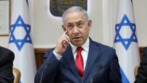 Israeli Prime Minister Benjamin Netanyahu rubs his face as he chairs the weekly cabinet meeting at his office in Jerusalem on July 7, 2019.  ABIR SULTAN / POOL / AFP