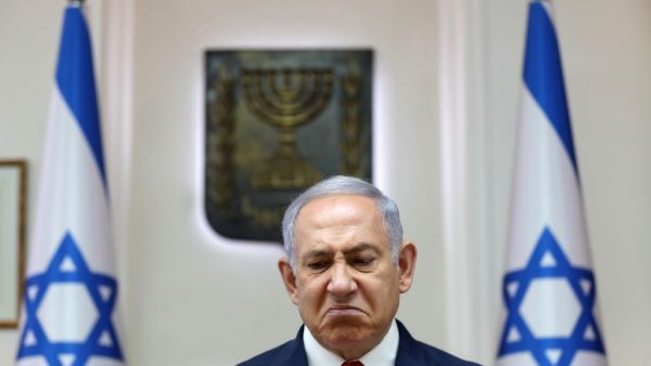 Israeli Prime Minister Benjamin Netanyahu grimaces as he chairs the weekly cabinet meeting at his office in Jerusalem on July 7, 2019.  ABIR SULTAN / POOL / AFP