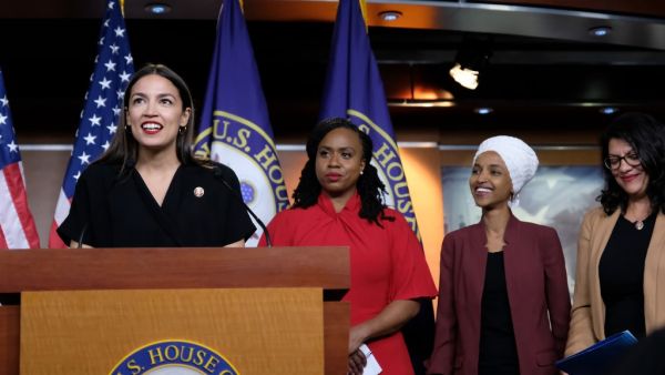 U.S. Rep. Alexandria Ocasio-Cortez (D-NY) speaks as Reps. Ayanna Pressley (D-MA), Ilhan Omar (D-MN), and Rashida Tlaib (D-MI) listen during a press conference at the U.S. Capito (AFP)