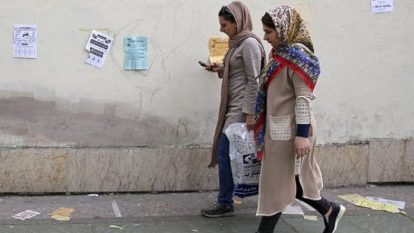 Tehran University students — men and women — protesting the pressure on women to wear mandatory headscarves in public  (Twitter)