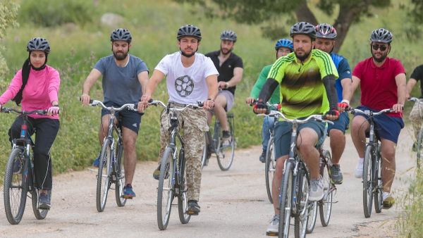 Crown Prince Al Hussein bin Abdullah II visits Umm Qais and tours the town on a bicycle (Twitter)