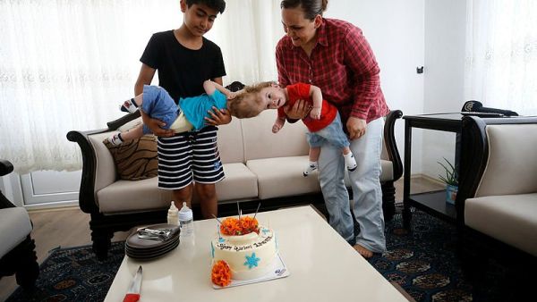 First birthday of their conjoined twins, Derman and Yiğit, in the Mediterranean province of Antalya (Twitter)