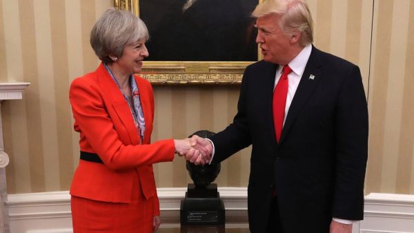 ترامب وماي يناقشان إمكانية التوصل لاتفاق تجاري