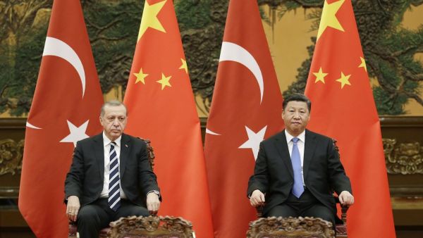Turkish President Tayyip Erdogan, left, and Chinese President Xi Jinping /AFP