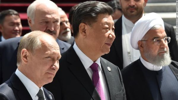 Russian President Vladimir Putin, Chinese President Xi Jinping and Iran's President Hassan Rouhani,  June 14 /AFP