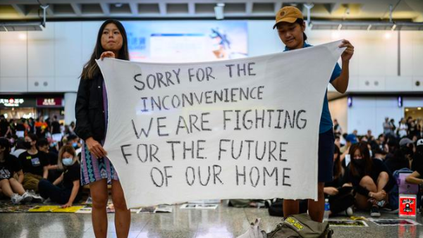 Students stage an airport sit-in, before new restrictions in Hong Kong /AFP