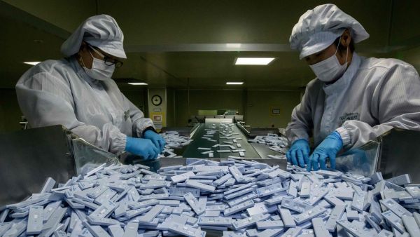 South Korea produces 100,000 COVID-19 test kits a day /AFP