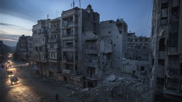 Destroyed buildings, including Dar Al-Shifa hospital, are seen on Sa'ar street in Aleppo, Syria. /AFP