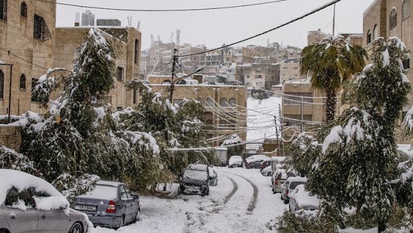 In Pictures: Major Snowstorm Hits Amman, Jordan