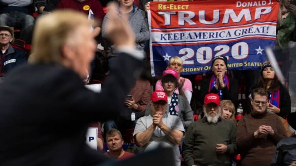 Supporters listen as U.S. President Donald Trump speaks during a Make America Great Again rally in Green Bay, Wisconsin, Saturday. (AFP-JIJI) Supporters listen as U.S. President Donald Trump speaks during a Make America Great Again rally in Green Bay, Wisconsin, Saturday. (AFP-JIJI)