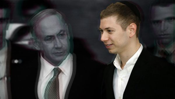 Israeli Prime Minister Benjamin Netanyahu and his son, Yair, visit the Wailing Wall in Jerusalem on March 18, 2015 (Thomas Coex/AFP)