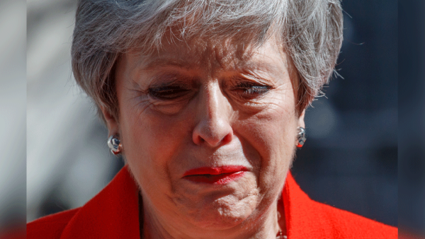 Britain's Prime Minister Theresa May reacts as she announces her resignation outside 10 Downing street in central London on May 24, 2019. Beleaguered British Prime Minister Theresa May announced on Friday that she will resign on June 7, 2019 following a Conservative Party mutiny over her remaining in power.