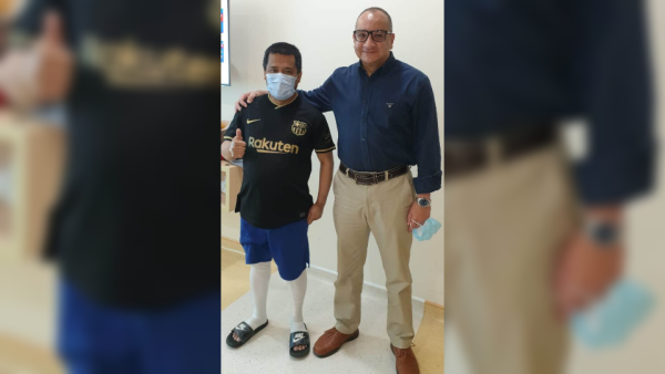 Lawrence with Dr. Helmy. Zulekha Hospital Saves Expat with Critical Heart Condition by performing an Urgent Complex Heart Surgery