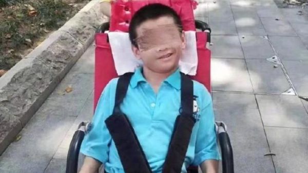 A 17-year-old with cerebral palsy died after his father and brother were put in quarantine in China over coronavirus suspicions.