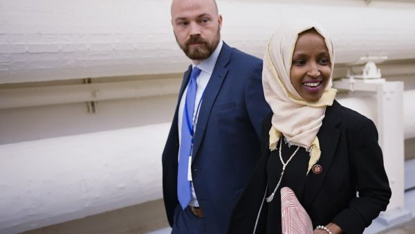 Representative Ilhan Omar (D-MN) walks from the House Chamber after a House vote on a resolution to condemn anti-Semitism and other forms of hatred and bigotry, at the US Capitol in Washington, DC. (AFP/ File Photo)