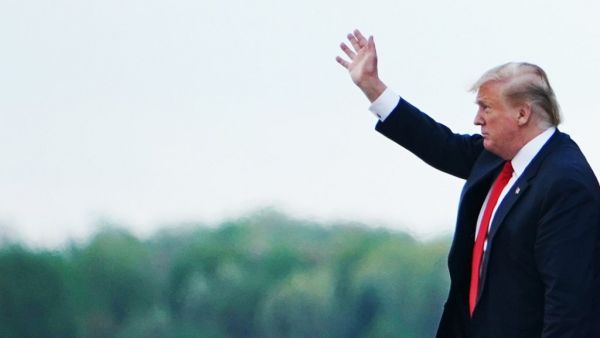 US President Donald Trump waves as he steps off Air Force One upon arrival at Andrews Air Force Base in Maryland on April 21, 2019. Trump and his family returned to Washington after spending Easter weekend at his Mar-a-Lago resort. MANDEL NGAN / AFP