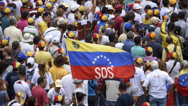 Supporters of Venezuelan opposition leader and self-proclaimed interim president Juan Guaido attend a rally in Caracas on May 11, 2019. (YURI CORTEZ / AFP)