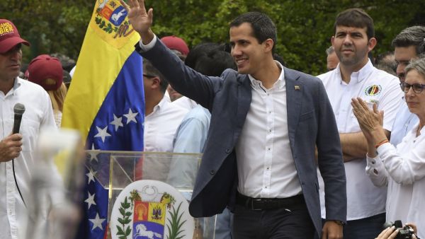 Venezuelan opposition leader Juan Guaido on Saturday urged his supporters once again to protest nationwide against President Nicolas Maduro, who has slowly ratcheted up the pressure on the lawmaker since a failed military uprising. (RONALDO SCHEMIDT / AFP)