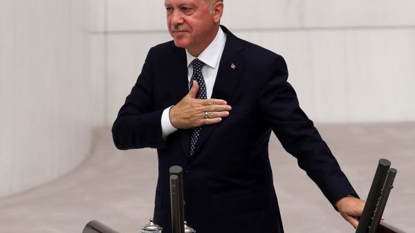Turkish President Recep Tayyip Erdogan gestures as he delivers a speech during the opening of the third legislative session of the Turkish parliament’s 27th term on October 1, 2019 at the Grand National Assembly of Turkey (TBMM) in Ankara. Adem ALTAN / AFP