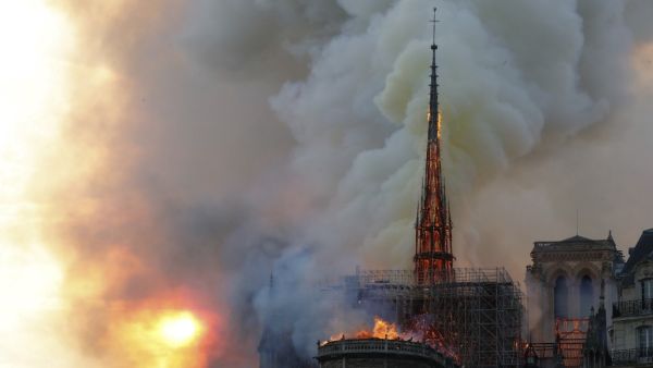 Smoke billow and flames burn from the roof of the landmark Notre-Dame Cathedral in central Paris on April 15, 2019. FRANCOIS GUILLOT / AFP Smoke billow and flames burn from the roof of the landmark Notre-Dame Cathedral in central Paris on April 15, 2019. FRANCOIS GUILLOT / AFP