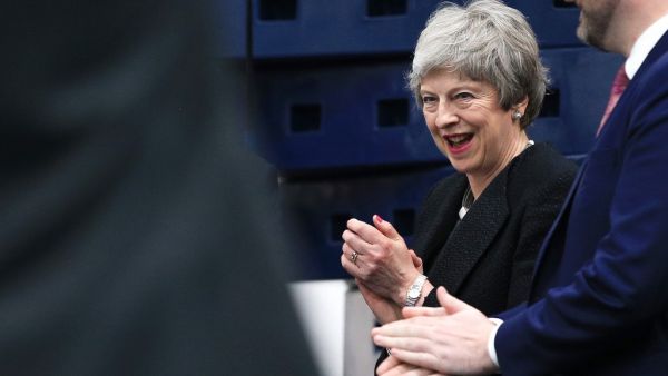 Britain's Prime Minister Theresa May gestures during a visit to the Leisure Box in Brierfield, Lancashire, on April 25, 2019, during campaigning for the local elections.  (Peter Byrne / POOL / AFP)