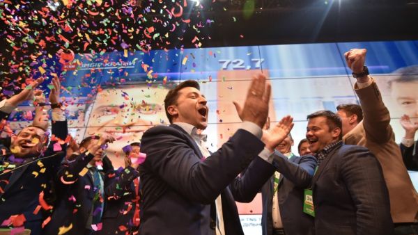 Ukrainian comedian and presidential candidate Volodymyr Zelensky reacts after the announcement of the first exit poll results in the second round of Ukraine's presidential election at his campaign headquarters in Kiev on April 21, 2019.  (AFP)