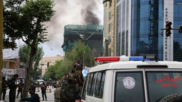 Smoke billows from a building during an ongoing attack by Taliban militants on a compound housing and international aid organisation in Kabul on May 8, 2019. (AFP/ File)